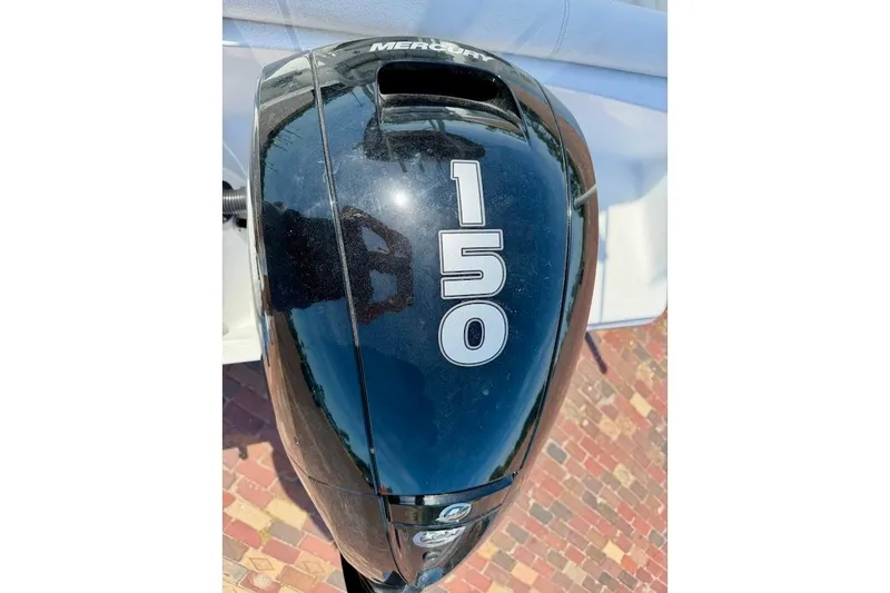 Slide: The Image of Mercury 150 outboard motor on 2020 Sportsman Heritage 211 Center Console boat. - 15