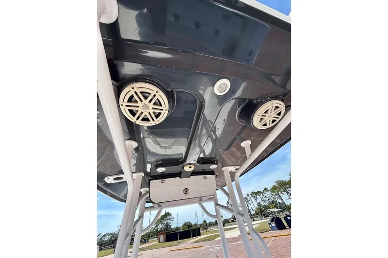 Slide: The Image of 2020 Sportsman Heritage 211 Center Console boat speakers and structure, viewed from below. - 21