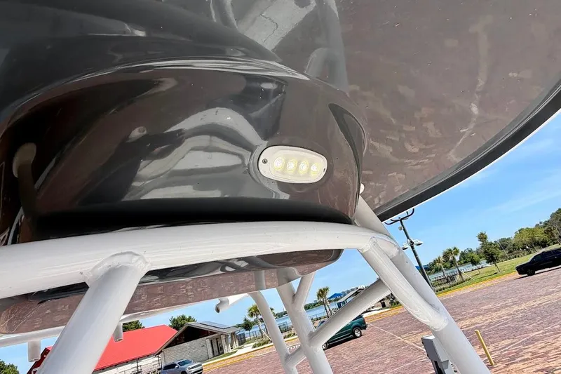 Slide: The Image of 2020 Sportsman Heritage 211 Center Console boat with LED light detail. - 26