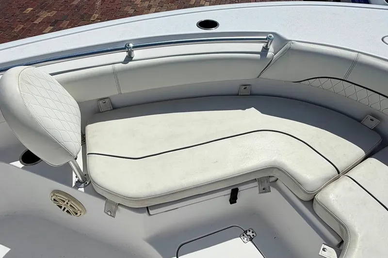 Slide: The Image of 2020 Sportsman Heritage 211 Center Console boat with cushioned seating and sleek design. - 31