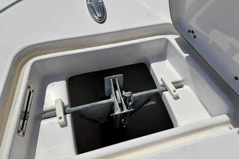 Slide: The Image of Anchor storage compartment on 2020 Sportsman Heritage 211 Center Console boat. - 35