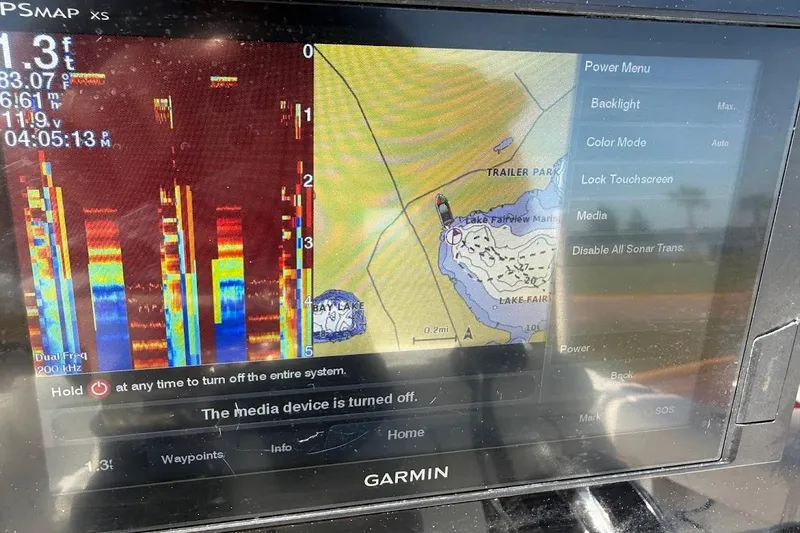 Slide: The Image of Garmin GPS display on 2020 Sportsman Heritage 211 Center Console boat. - 38