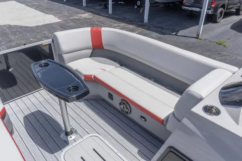 Slide: The Image of 2026 SunCatcher Select 322SL boat interior with sleek seating and modern table design. - 14