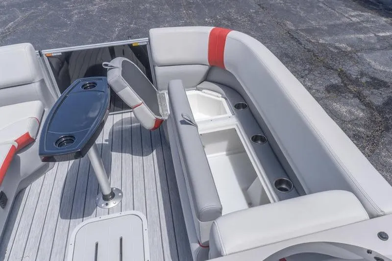 Slide: The Image of Interior of 2026 SunCatcher Select 322SL boat with seating and storage compartments. - 15