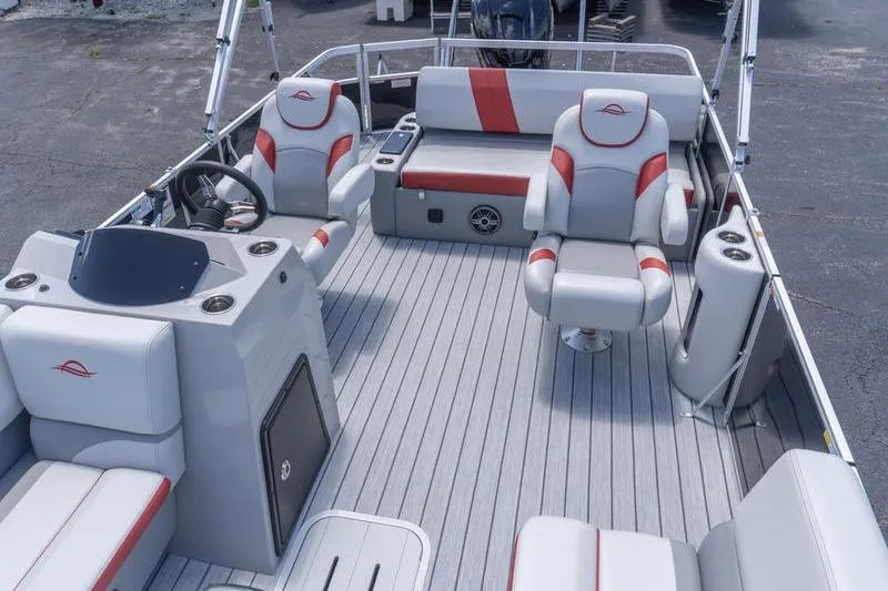 Slide: The Image of 2026 SunCatcher Select 322SL pontoon boat interior with gray and red seating. - 20