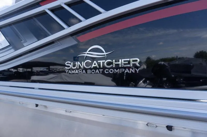 Slide: The Image of 2026 SunCatcher Select 322SL boat by Yamaha Boat Company, sleek design detail. - 24