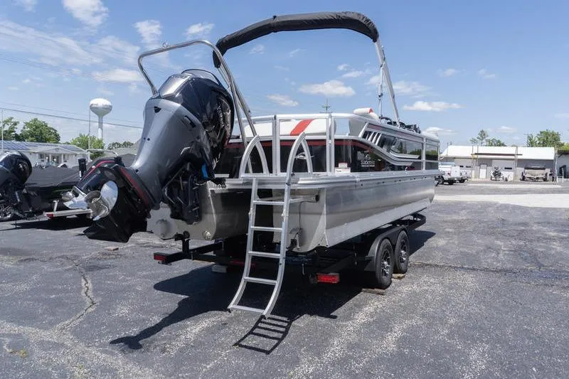 Slide: The Image of 2026 SunCatcher Select 322SL pontoon boat on trailer, featuring powerful outboard motor. - 3