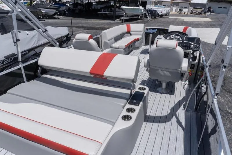 Slide: The Image of 2026 SunCatcher Select 322SL pontoon boat interior with modern seating and helm. - 6