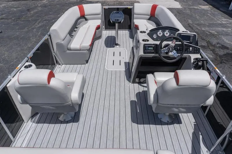 Slide: The Image of 2026 SunCatcher Select 322SL pontoon boat interior with modern seating and steering console. - 8
