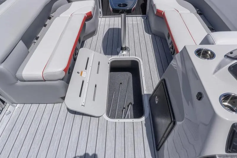 Slide: The Image of Interior of 2026 SunCatcher Select 322SL boat with seating and storage compartments. - 9
