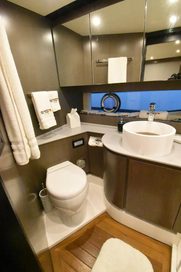 Slide: The Image of Luxurious bathroom in 2024 OKEAN 52 yacht with modern fixtures and elegant design. - 11