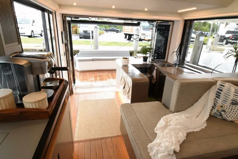 Slide: The Image of Luxurious interior of 2024 OKEAN 52 yacht with modern furnishings and open layout. - 19