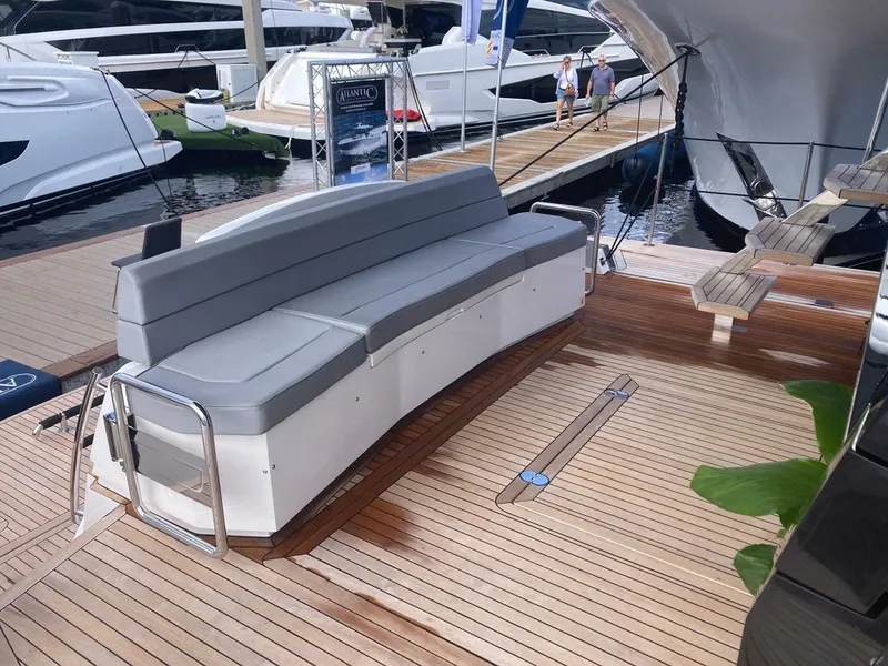 Slide: The Image of Luxury 2024 OKEAN 52 yacht with sleek deck seating and modern design. - 28