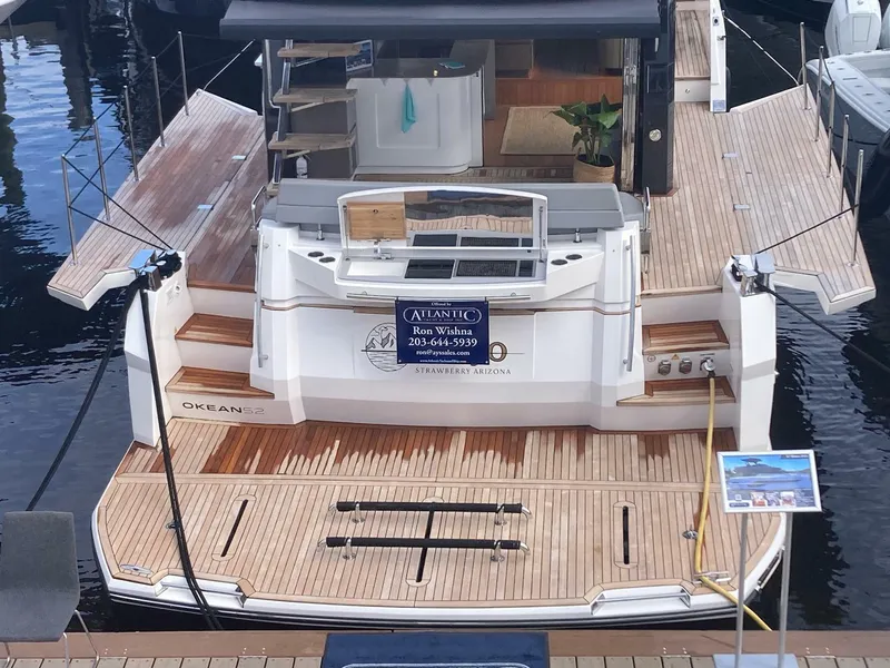 Slide: The Image of 2024 OKEAN 52 yacht with spacious teak deck and modern design. - 34