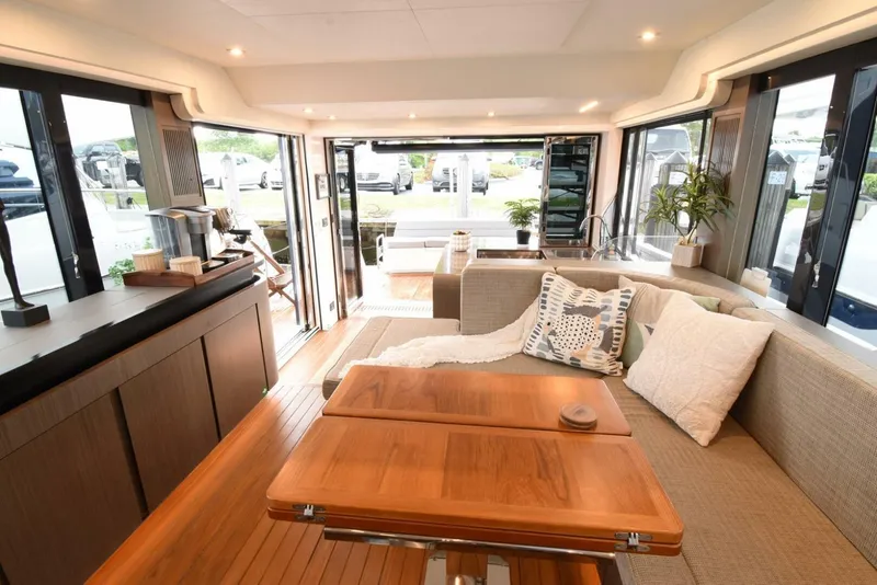 Slide: The Image of Luxurious interior of 2024 OKEAN 52 yacht with modern furnishings and open layout. - 6