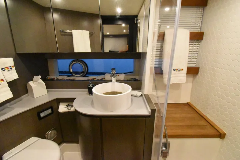 Slide: The Image of Luxurious bathroom in 2024 OKEAN 52 yacht with modern fixtures and elegant design. - 9