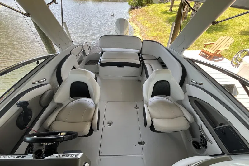 Slide: The Image of 2022 Crownline 260 XSS boat interior with luxurious seating and modern design. - 13