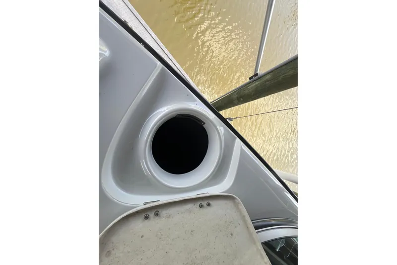 Slide: The Image of 2022 Crownline 260 XSS boat detail with water reflection. - 19