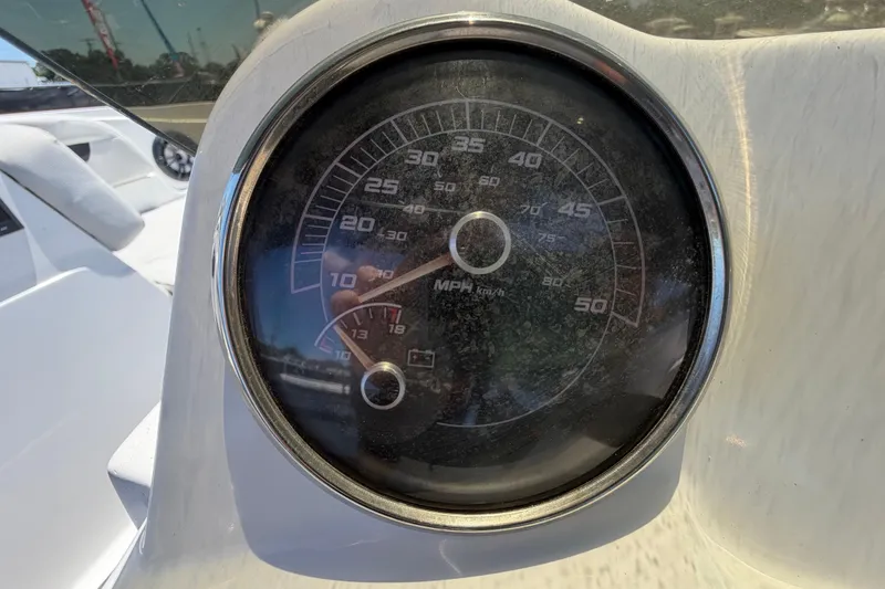 Slide: The Image of Close-up of a 2022 Hurricane SunDeck Sport 185 OB speedometer, displaying speed in MPH. - 19