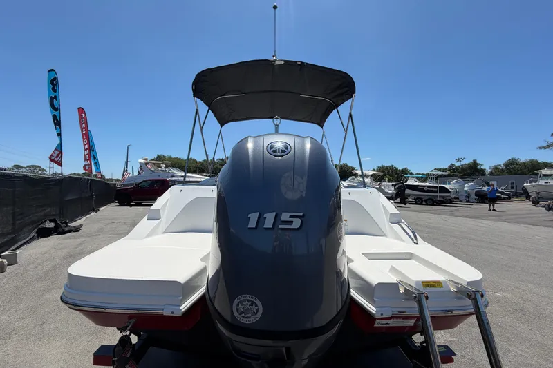 Slide: The Image of 2022 Hurricane SunDeck Sport 185 OB boat with 115 HP engine, displayed outdoors. - 3