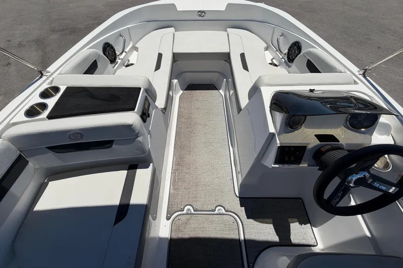 Slide: The Image of 2022 Hurricane SunDeck Sport 185 OB boat interior with seating and steering console. - 30