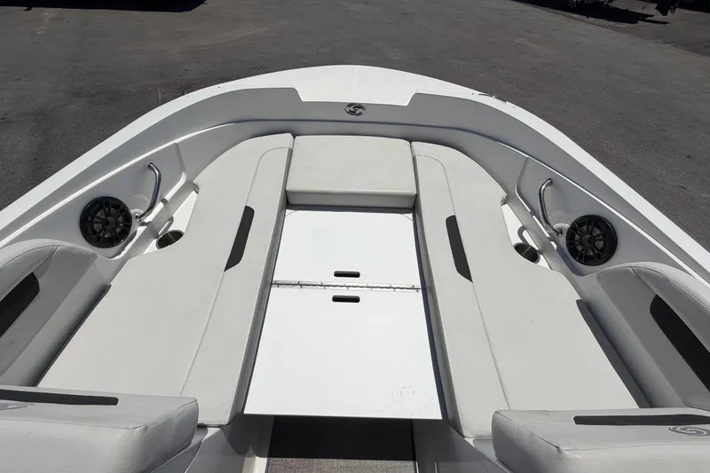 Slide: The Image of 2022 Hurricane SunDeck Sport 185 OB boat interior with spacious seating and built-in speakers. - 36