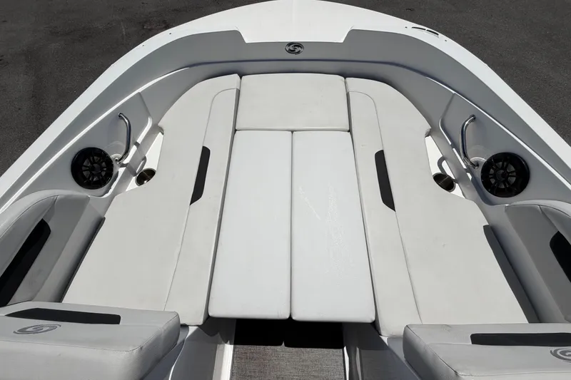 Slide: The Image of 2022 Hurricane SunDeck Sport 185 OB boat interior with cushioned seating and speakers. - 37