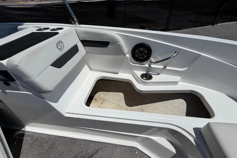 Slide: The Image of Interior of 2022 Hurricane SunDeck Sport 185 OB boat, featuring seating and speaker. - 39