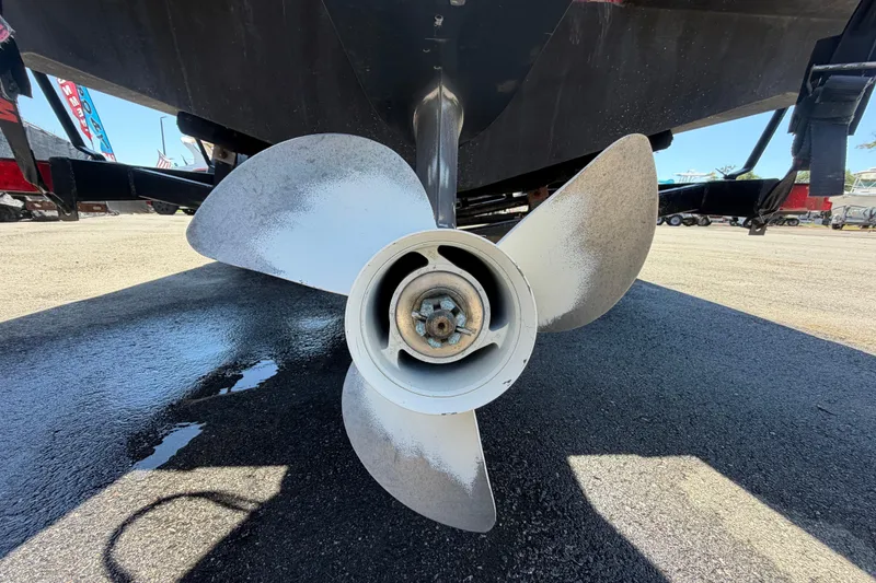 Slide: The Image of Propeller of 2022 Hurricane SunDeck Sport 185 OB boat on trailer. - 4