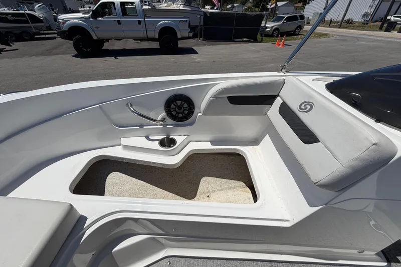 Slide: The Image of 2022 Hurricane SunDeck Sport 185 OB boat interior with seating and speaker. - 41
