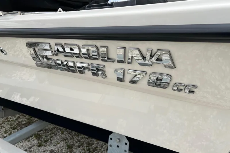Slide: The Image of Close-up of Carolina Skiff 178 cc boat logo, 2026 model. - 20