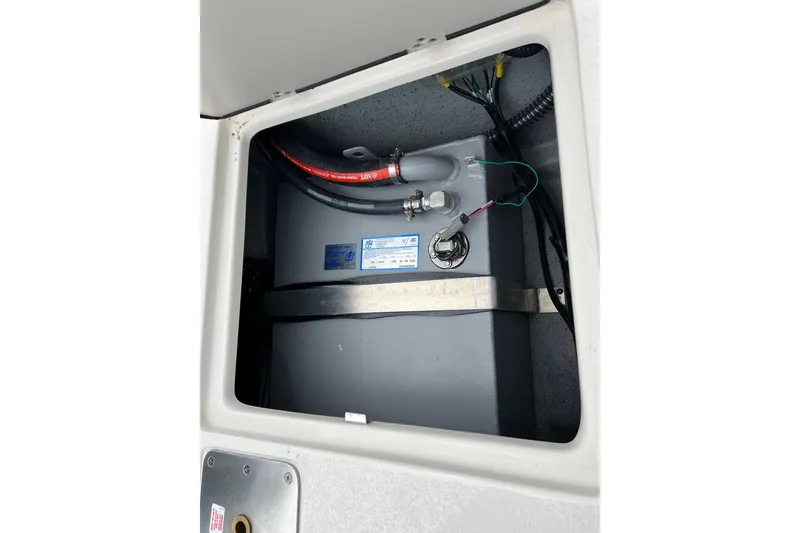 Slide: The Image of Fuel tank compartment of a 2026 Carolina Skiff 21 LS boat. - 28