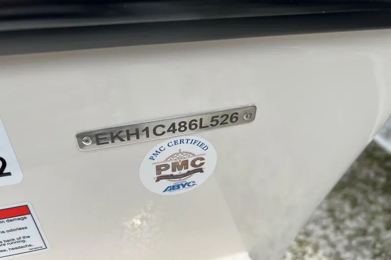 Slide: The Image of 2026 Carolina Skiff 21 LS boat with PMC certification and identification number. - 32