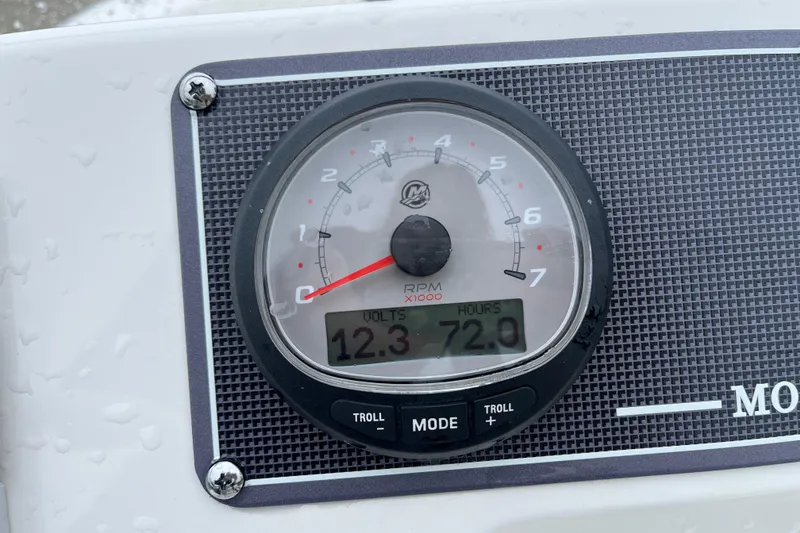 Slide: The Image of Close-up of a 2023 Boston Whaler 170 Montauk boat tachometer displaying 12.3 volts and 72 hours. - 10