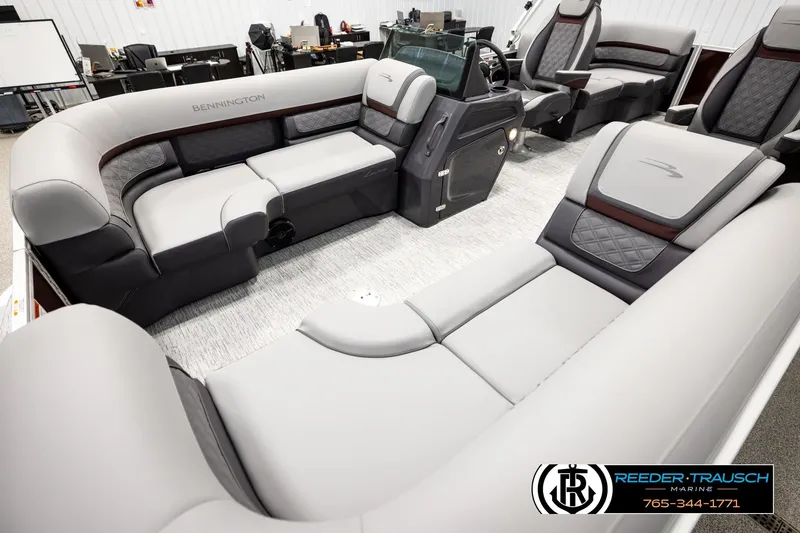 Slide: The Image of Luxurious interior of 2026 Bennington S20 Luxe pontoon boat with plush seating. - 10