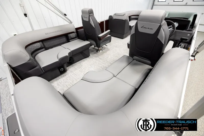 Slide: The Image of 2026 Bennington S20 Luxe pontoon boat interior with luxurious seating and modern design. - 12