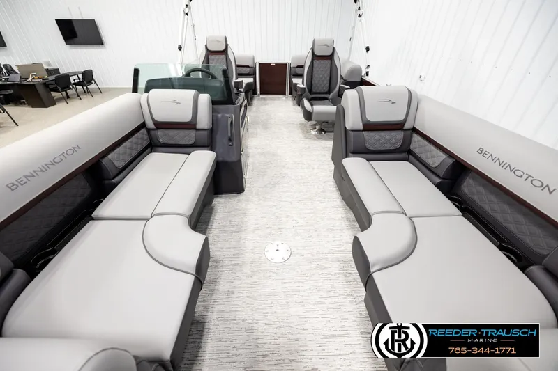 Slide: The Image of Luxurious interior of 2026 Bennington S20 Luxe pontoon boat with plush seating. - 13