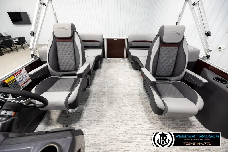 Slide: The Image of 2026 Bennington S20 Luxe interior with luxurious seating and modern design. - 14