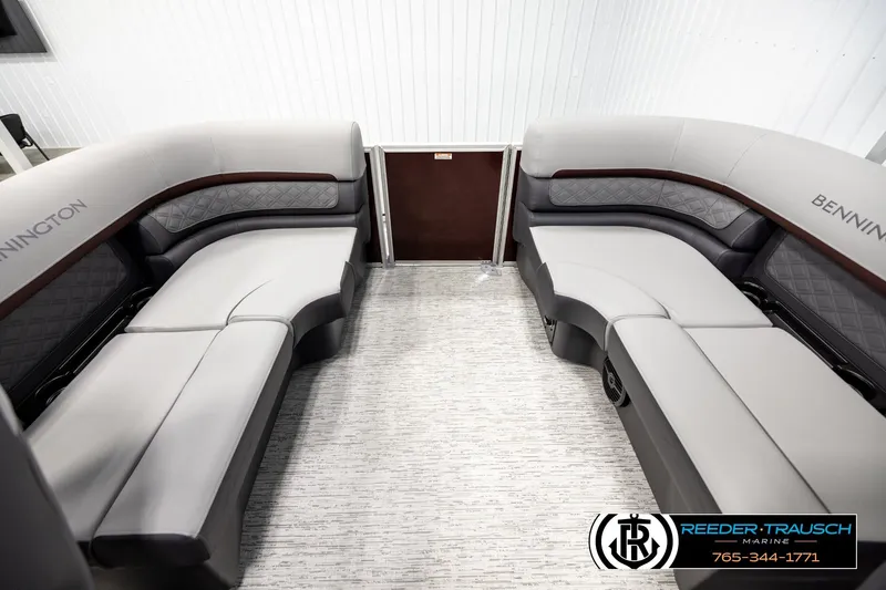 Slide: The Image of 2026 Bennington S20 Luxe interior with elegant seating and modern design. - 15