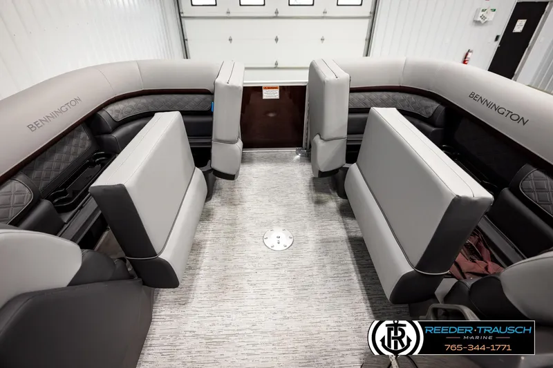 Slide: The Image of 2026 Bennington S20 Luxe boat interior with plush seating and modern design. - 20