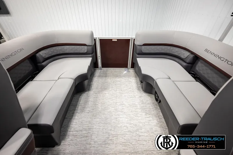 Slide: The Image of 2026 Bennington S20 Luxe interior with plush seating and elegant design. - 21
