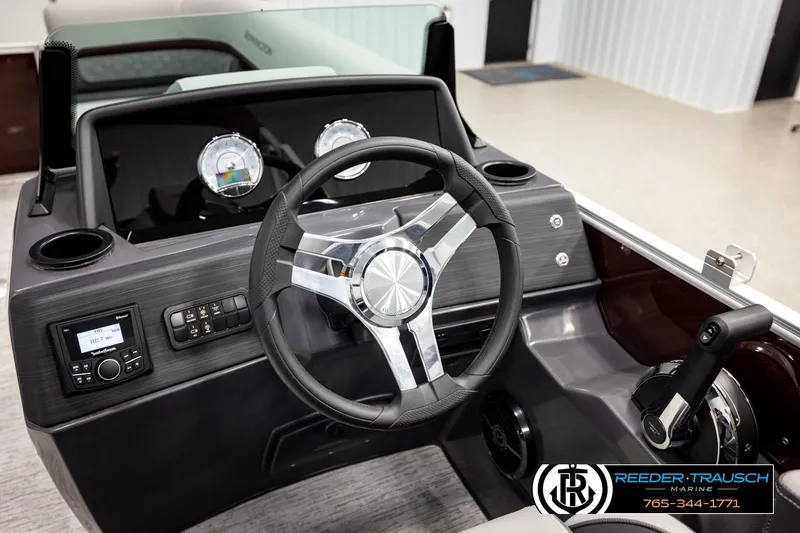 Slide: The Image of 2026 Bennington S20 Luxe boat dashboard with steering wheel and control panel. - 26