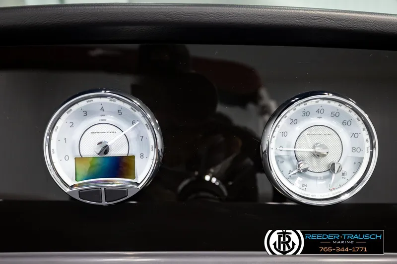 Slide: The Image of Dashboard of 2026 Bennington S20 Luxe with speedometer and tachometer gauges. - 31