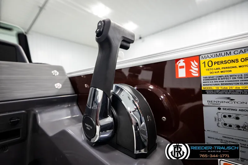 Slide: The Image of Throttle control of 2026 Bennington S20 Luxe boat with capacity label. - 33