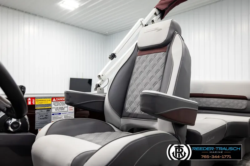 Slide: The Image of 2026 Bennington S20 Luxe boat interior with luxurious seating and detailed upholstery. - 35