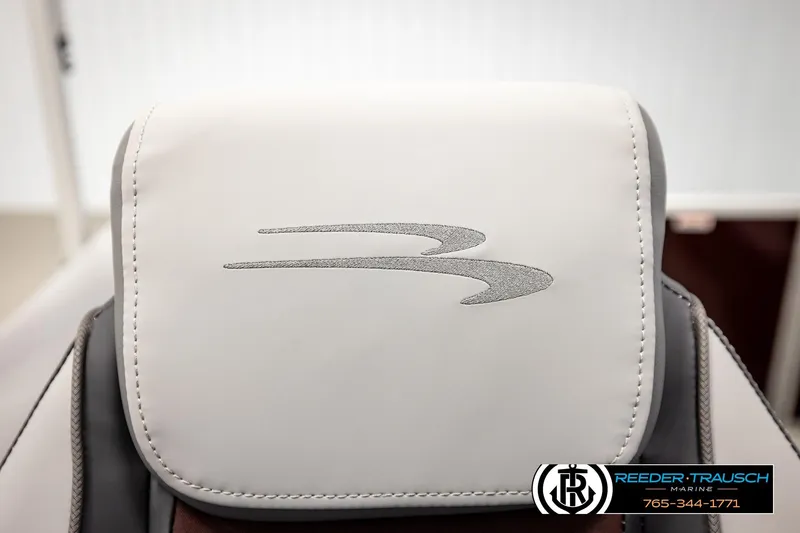 Slide: The Image of 2026 Bennington S20 Luxe seat with logo, featuring Reeder-Trausch Marine branding. - 36