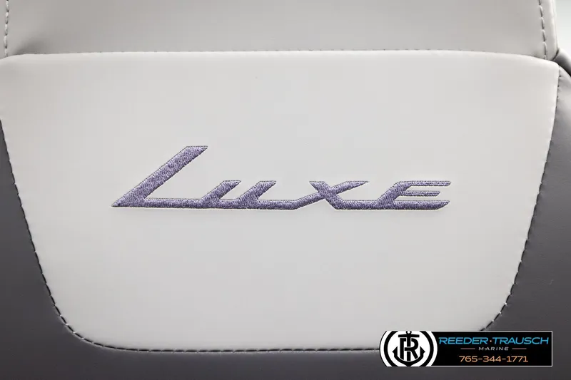 Slide: The Image of 2026 Bennington S20 Luxe logo on white and gray upholstery. - 37