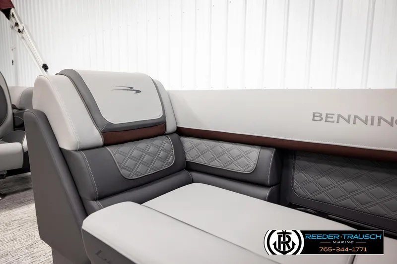 Slide: The Image of Luxurious interior of 2026 Bennington S20 Luxe pontoon boat with elegant seating design. - 38