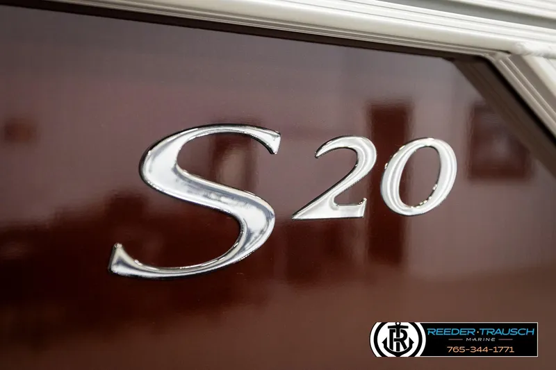 Slide: The Image of 2026 Bennington S20 Luxe boat emblem with Reeder-Trausch Marine contact details. - 45