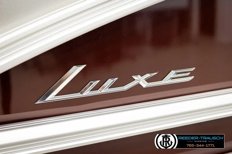 Slide: The Image of 2026 Bennington S20 Luxe boat logo with Reeder-Trausch Marine contact details. - 46